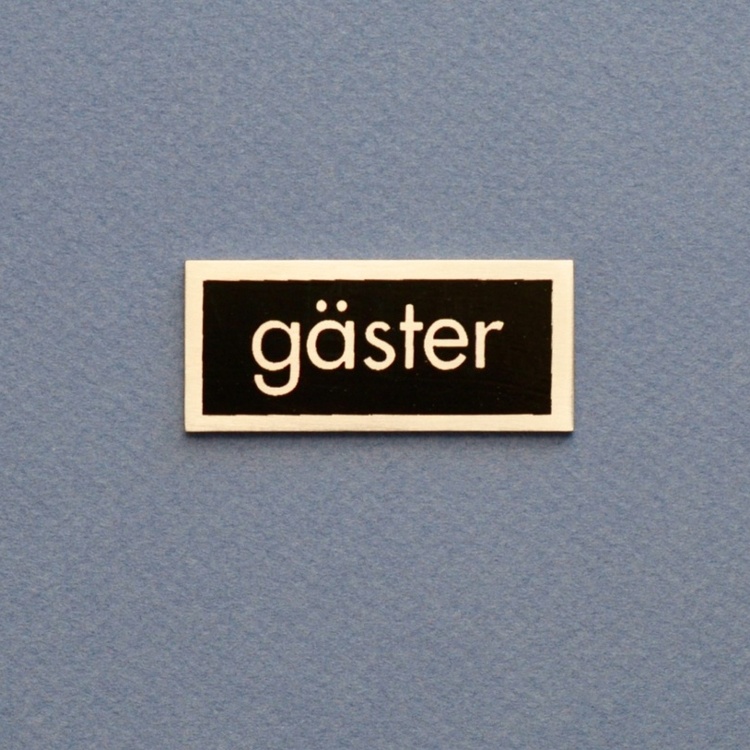 Gjesteskilt, Svart