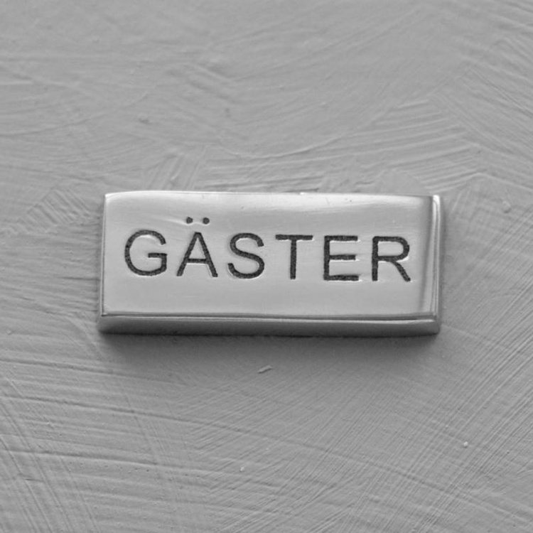 Gjesteskilt i metall