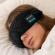 Sovemaske med trådløse hodetelefoner