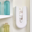 Selvklebende holder for plastposer