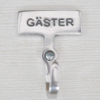 Gjesteskilt med knagg i blank metall, Gjester